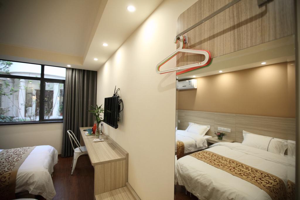 Suzhou Homa Garden Hotel Стая снимка